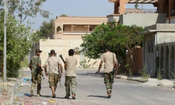 Des combattants pro-gouvernementaux dans les rues de Syrte, le 3 août 2016