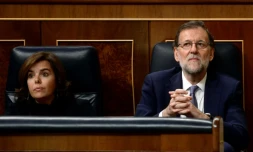 La vice-présidente du gouvernement espagnol Soraya Saenz de Santamaria, au cÎté du Premier ministre Mariano Rajoy, à Madrid, le 31 août 2016