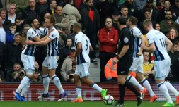 Le défenseur de West Bromwich Craig Dawson (2g) auteur d'un doublé face à Arsenal, le 18 mars 2017 à West Bromwich
