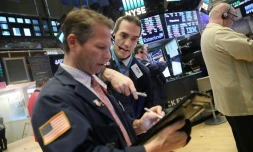 Traders sur le parquet du New York Stock Exchange le 6 février 2018
