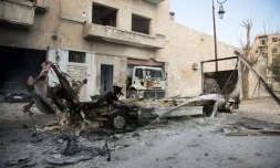 Les épaves de véhicules dans le quartier rebelle d'Alep, le 19 novembre 2016