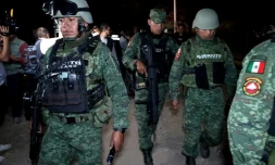 Des militaires montent la garde après une attaque à l'explosif à Tlajomulco de Zuñiga, dans la banlieue de Guadalajara, le 12 juillet 2023 au Mexique