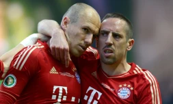 Les joueurs du Bayern Munich Franck Ribéry et Arjen Robben lors de la victoire à domicile 5-1 face à Francfort en derniÚre journée du championnat d'Allemagne le 18 mai 2019