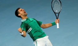 Le Serbe Novak Djokovic aprÚs sa victoire sur l'Américain Taylor Fritz au 3e tour de l'Open d'Australie, à Melbourne, le 12 février 2021