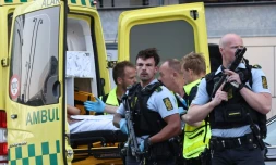 Des secouristes et des policiers sur les lieux d'une fusillade qui a fait plusieurs victimes à Copenhague, le 3 juillet 2022