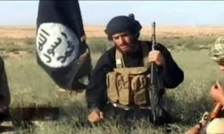 Capture d'écran d'une video postée le 8 juillet 2012 sur YouTube du porte-parole officiel de l'organisation EI, le syrien Abou Mohammed Al-Adnani