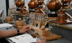 In a Singapore distillery, the smell of pine, citrus and flowers fills the air as students crush juniper berries, blending them with their own choice of ingredients to make custom gin with an Asian twist