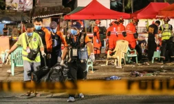 Des secouristes sur les lieux de l'attentat à Davao, aux Philippines, le 3 septembre 2016