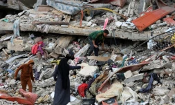 Des Gazaouis de retour dans leur quartier de al Zeitoun, au sud de Gaza-ville, le 9 février 2025