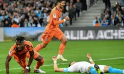 L'OM a été terrassé par Lyon, porté par son double buteur Maxwell Cornet (g), dans le choc des Olympiques, le 12 mai 2019 au Vélodrome