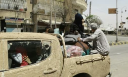 Des civils syriens fuient la ville de Hassaké, le 22 août 2016