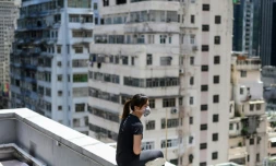"Jane", un pseudonyme, 24 ans, a menti durant des semaines à sa mÚre à qui elle a caché sa participation aux manifestations à Hong Kong, photographiée le 6 septembre 2019