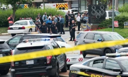 Des policiers devant les locaux du Capital Gazette à Annapolis, dans le Maryland, le 28 juin 2018