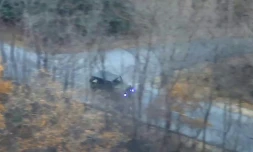 Capture d'image d'une vidéo fournie par le Commandement des Nations Unis en Corée montrant un militaire nord-coréen à bord d'un véhicule se dirigeant vers la Zone démilitarisée, le 22 novembre 2017