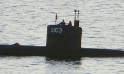 La journaliste suédoise Kim Wall à côté d'un homme à bord du Nautilus le 10 août 2017 à Copenhague