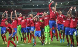 La joie des joueurs du Costa Rica, vainqueurs 1-0 de la Nouvelle-Zélande et qualifiés pour la Coupe du monde 2022 au Qatar, le 14 juin 2022 à Ar-Rayyan