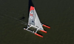 Le trimaran "Idec" du Français Francis Joyon au départ de "The Bridge 2017", le 25 juin 2017 à Saint-Nazaire, France  