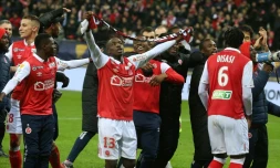 Les joueurs du Stade de Reims fêtent leur victoire sur RC Strasbourg à l'issue des tirs au but au stade Auguste-Delaune, le 7 janvier 2020