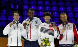 Le fleuriste français Enzo Lefort (2g) champion du monde à Budapest le 20 juillet 2019