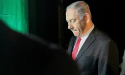 Le Premier ministre israélien Benjamin Netanyahu, accusé dans plusieurs affaires de corruption, quitte une conférence à Tel-Aviv, le 14 février 2018