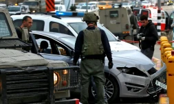 Des policiers israéliens sur les lieux d'un attentat près de Gush Etzion, un groupe de colonies israéliennes situées entre Jérusalem et Bethléem, le 15 mars 2017