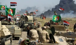 Les forces irakiennes et des membres des unités paramilitaires du Hachd al-Chaabi avancent vers Hawija, le 4 octobre 2017
