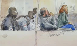 Croquis d'audience du 19 novembre 2019 montrant Mohamed Amri (2D) et Anne Diana Clain (D), durant leur procès à Paris
