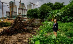 Niki So, une habitante de Kwu Tung dont la maison doit être démolie par les autorités pour faire place à un vaste projet de pôle technologique, le 17 juin 2026 dans les Nouveraux Territoires à Hong Kong