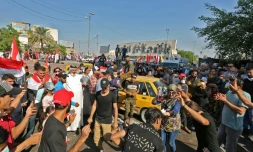 Des manifestants irakiens réunis sur la place Tahrir dans le centre de la capitale irakienne Bagdad, le 1er novembre 2019