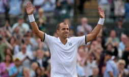 Le Luxembourgeois Gilles Muller après sa victoire face à l'Espagnol Rafael Nadal, le 10 juillet 2017 à Wimbledon