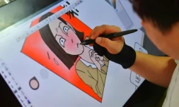 Le transfuge nord-coréen Choi Sung-Guk dessine une BD comique à Seoul, le 9 août 2016