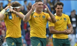 Ben McCalman de l'équipe d'Australie(à gauche), Sean McMahon et Nick Phipps (à droite) après la victoire contre l'Uruguay lors de la coupe du monde de rugby le 26 septembre 2015 à Birmingham