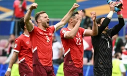 Les joueurs suisses célÚbrent leur victoire 3-1 face à la Hongrie pour leur entrée en lice dans l'Euro-2024, le 15 juin 2024 à Cologne (Allemagne)