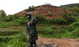 Sur le lieu du crash du Boeing 737-800 de China Eastern prĂšs de Wuzhou, en Chine, le 24 mars 2022