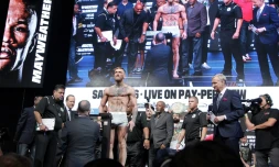 L'Irlandais Conor McGregor lors de la pesée avant son combat de boxe samedi contre l'Américain Floyd Mayweather, le 25 août 2017, à Las Vegas
