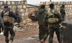 Des soldats du régime syrien déployés le 30 novembre 2016 à Sheikh Saeed un quartier d'Alep