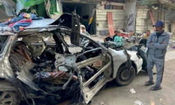 La voiture calcinée des trois fils du chef du Hamas dans le camp de réfugiés de Chati, dans la ville de Gaza, le 10 avril 2024