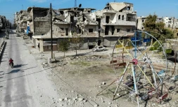 Une photo prise le 22 décembre 2019 montre des immeubles détruits dans la ville de Maaret al-Noomane dans la province d'Idleb, dans le nord-ouest de la Syrie