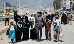 Des civils irakiens fuient les combats de Mossoul, le 30 mars 2017