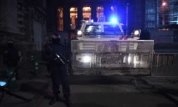 La police belge monte la garde devant le tribunal de Bruxelles le 8 février 2018, au deuxiÚme jour du procÚs de Salah Abdeslam