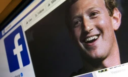 Photo d'illustration prise le 22 mars 2018 à Moscou montrant le patron de Facebook Mark Zuckerberg sur une page du réseau social.