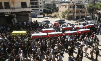 Les funérailles de victimes d'une frappe aérienne israélienne ayant visé le village de Kfar Remmane la veille, dans le sud du Liban, le 8 septembre 2026