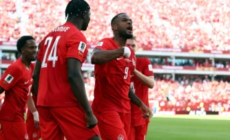 L'attaquant Cyle Larin (N.9), auteur de l'égalisation du Canada face à la Bosnie-Herzégovine, lors de la Coupe du monde, le 12 juin 2026 à Toronto