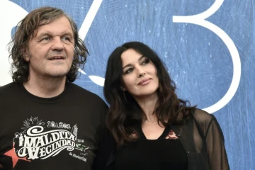 Le réalisateur Emir Kusturica et l'actrice Monica Bellucci lors de la présentation du film "On the Milky Road" à la Mostra de Venise, le 9 septembre 2016 
