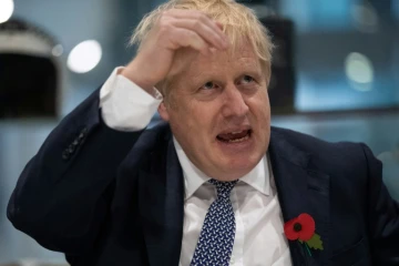 Le Premier ministre britannique Boris Johnson lors de la visite d'un centre de formation de la police à Hendon, dans le nord de Londres, le 31 octobre 2019. 