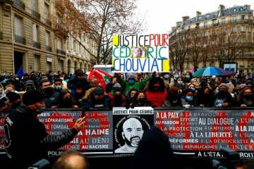 Marche blanche à la mémoire de Cédric Chouviat, un livreur mort après un contrôle musclée de la police un an plus tôt, le 3 janvier 2021 à Paris