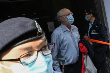 L'avocat américain John Clancey, qui travaille pour un cabinet spécialisé dans les questions de droits de l'Homme, est emmené par la police après avoir été arrêté à Hong Kong, le 6 janvier 2021