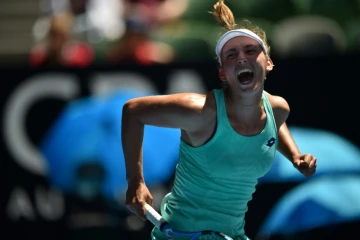 La Belge Elise Mertens exulte après sa qualification en demi-finale de l'Open d'Australie en éliminant l'Ukrainienne Elina Svitolina, le 23 janvier 2018 à Melbourne
