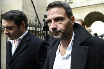 Jérôme Kerviel (D)  et son avocat David Koubbi à leur arrivée au palais de justice le 18 janvier 2016 à Paris 