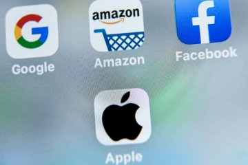 Les logos des géants américains du numérique, Google, Apple, Facebook et Amazon visés par la taxe française, dite "Gafa"